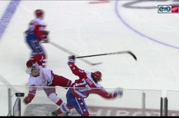 Oshie leaves game after taking hard hit from Sheahan