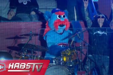 Unofficial Canadiens mascot METAL! performs a drum solo at the Bell Centre