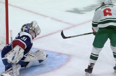 Philipp Grubauer stymies Ryan Donato on a breakaway