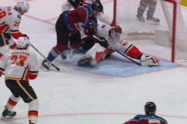 Mike Smith stretches out to rob Gabriel Landeskog with the glove