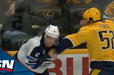 Jets' Brenden Dillon Drops Gloves with Predators' Cal Foote After Laying Big Hit