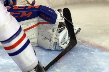 Talbot gets stick caught in his goalie equipment