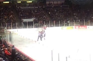 WHL Hockey Fight-Thomas Foster (Kelowna Rockets) vs Justin Kirkland (Vancouver Giants) March 1/2014