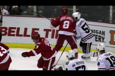 Abdelkader levels Campbell with a shoulder to the chin