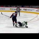 Stars’ Janmark tries to enter the zone but gets leveled by Zadorov