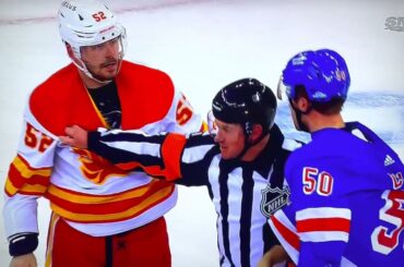 Milan Lucic takes a huge hit by Sammy Blais a fight and a scrum ensues