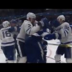 Morgan Reilly hits Brayden Point into the boards and Kucherov responds