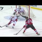 Yegor Sharangovich touches a puck and assist on Bratt's goal vs Hurricanes (22 jan 2022)