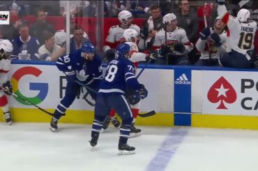 TJ. Brodie puck over glass penalty