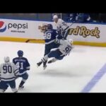 Mikhail Sergachev lays out John Tavares with a hit