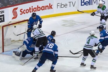 Mark Scheifele bats puck away to deny Heiskanen of sure goal