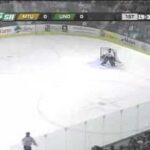 TJ Oshie Lays another BIG Hit on a Michigan Tech Player