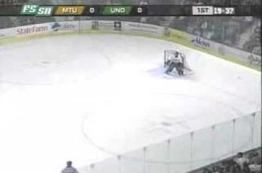 TJ Oshie Lays another BIG Hit on a Michigan Tech Player