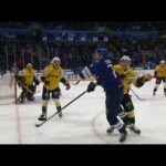 Geraskin hits Tarasov in the back