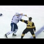 Martin shaken up in collision, returns and drops the mitts with Beleskey