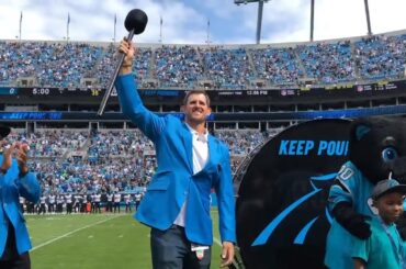 Panthers Hall of Honor inductee Jordan Gross hits the Keep Pounding drum