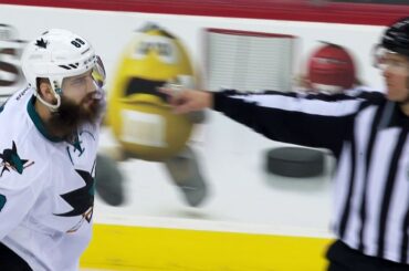 Unhappy linesman tells Burns to retrieve puck