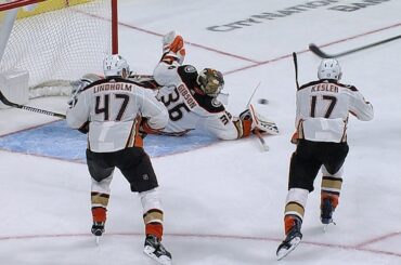 John Gibson comes through with the side of his mask