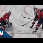 Devils' Haula Lets Puck Gently Slide Past Kuemper After Carlson Prevents Him From Deking