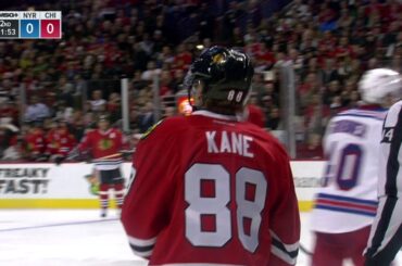 Gotta See It: Kane gets crushed against the boards then goes high on Miller