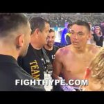 TIM TSZYU CONFRONTED BY MICHAEL ZERAFA SECONDS AFTER KNOCKING OUT MORGAIN IN 1ST ROUND