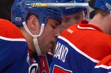 Lucic lays huge hit, draws penalty, then scores game-tying goal