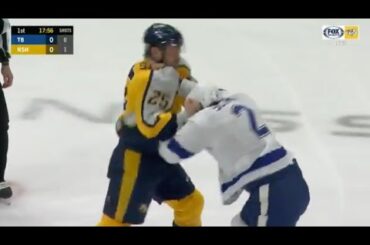 Mathieu Olivier and Luke Schenn throw hands on the ice #Predators #Lightning #NHL