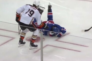 Troy Terry accidently shoots the puck at Jacob Trouba's head