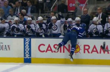 Soshnikov gets dumped into Jets bench by Thorburn