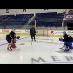 Former and Current Governors Academy goalies Sam Best (UMB) and Dave Palandjian (Govs) working small