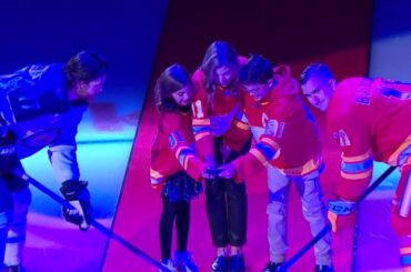 Family of Chris Snow drops the puck in Calgary