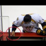 Michael Del Zotto sticks his gum on the Ottawa Senators visitors team bench