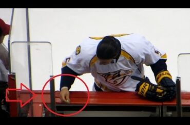 Michael Del Zotto sticks his gum on the Ottawa Senators visitors team bench