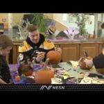 Bruins Players Decorate Pumpkins With Young Patients