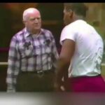 Mike Tyson training with fight manager Cus Damato in the Catskills Mountains of New York