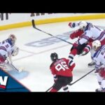 Trouba Lays Out Devils' Nosek With A Massive Hit In Front Of Rangers' Net