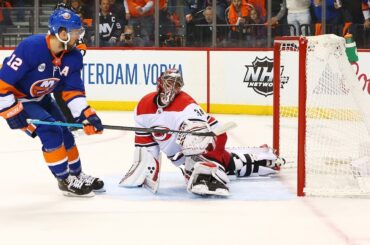 Petr Mrazek flashes the leather on Josh Bailey