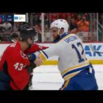 Jordan Greenway challenges Tom Wilson after Wilson elbows Owen Power