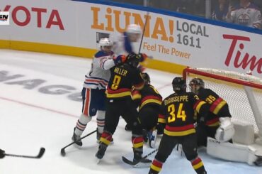 Canucks Vs Oilers Scrum, Connor McDavid Gets Away With Cross Check