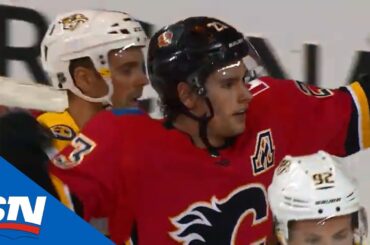 Sean Monahan Picks Up Loose Puck And Goes Backhand On Saros