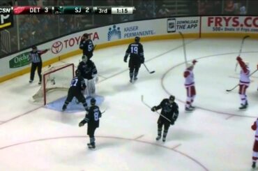 Luke Glendening wills his way past Joe Thornton for the goal