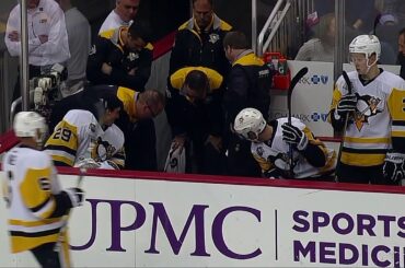 Gotta See It: Letang falls through the bench door