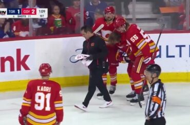 Martin Pospisil leaves the arena with a painful injury after being tripped by Auston Matthews