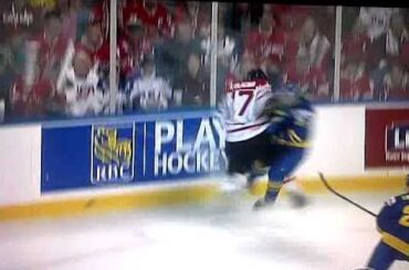 Canada's Marcus Foligno lowers the boom versus Sweden 12/31/10