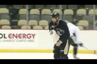 Evgeni Malkin and Craig Adams fight at practice