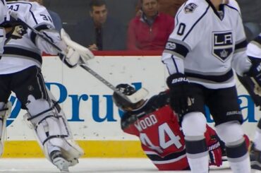 No call on Budaj after his stick makes contact with Wood's face