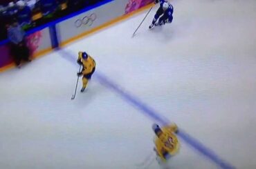 Carl Hagelin Gets Crushed by Slovenia's Sabahudin Kovacevic