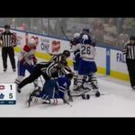 Leafs and canadiens scrum after late cross check by edmundson