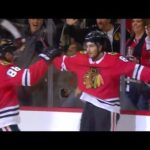 Blackhawks' Schmaltz scoops the puck up and slips it by Talbot