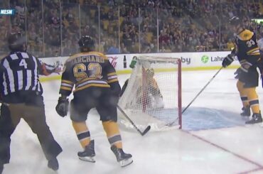 Anders Lee scores after Brad Marchand runs into Tuukka Rask behind the net.